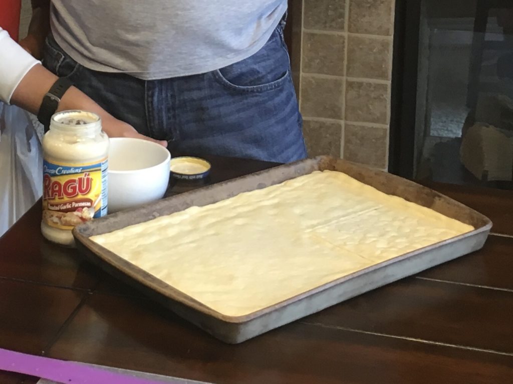Pizza crust ready for the oven.  This crust will be used to make a patriotic pizza.  It will be a flag
