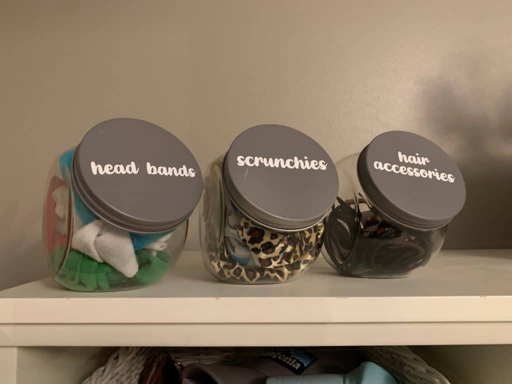 Dollar Tree Organization jars - only $1 each, decorated with spray paint and letters