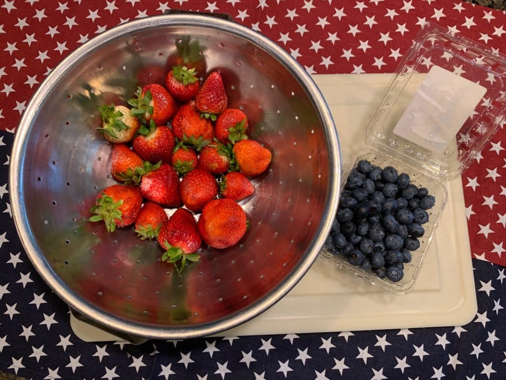 strawberries and blueberries for flag fruit pizza
