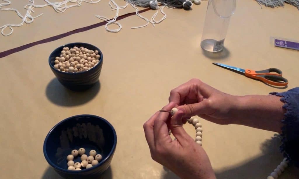 making a string with wood beads