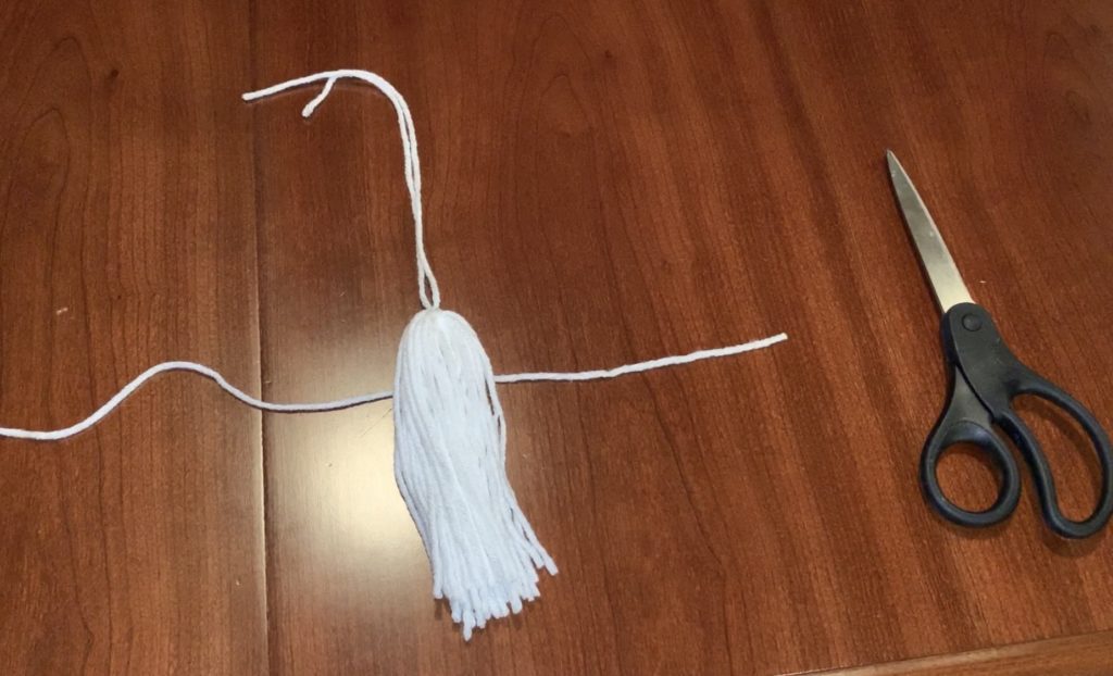 Determine where to tie off the yarn tassel