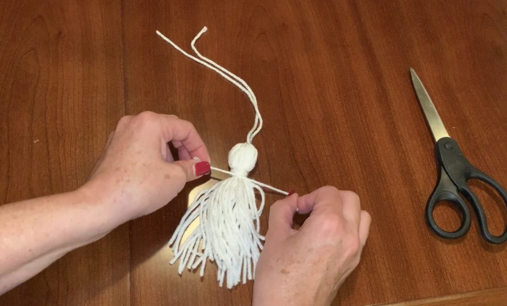Tie top section of the yarn tassel for the ghost tassel garland