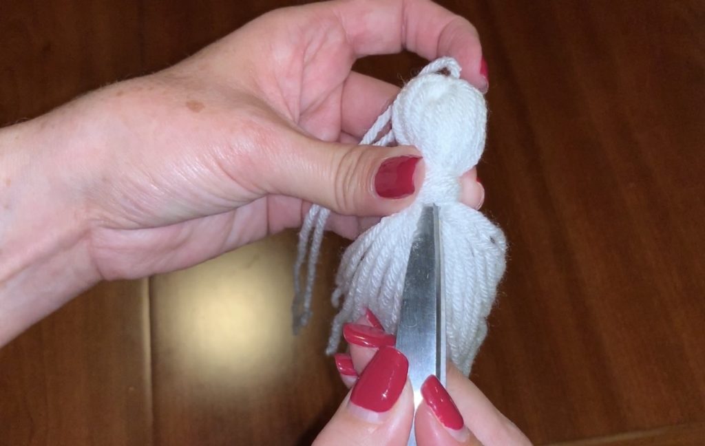 Trimming the tassel to make ghost tassel garland