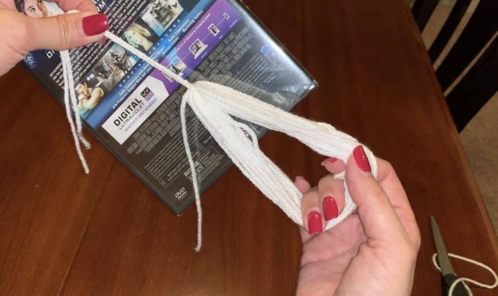 Making a yarn tassel to transform into a ghost tassel for ghost garland