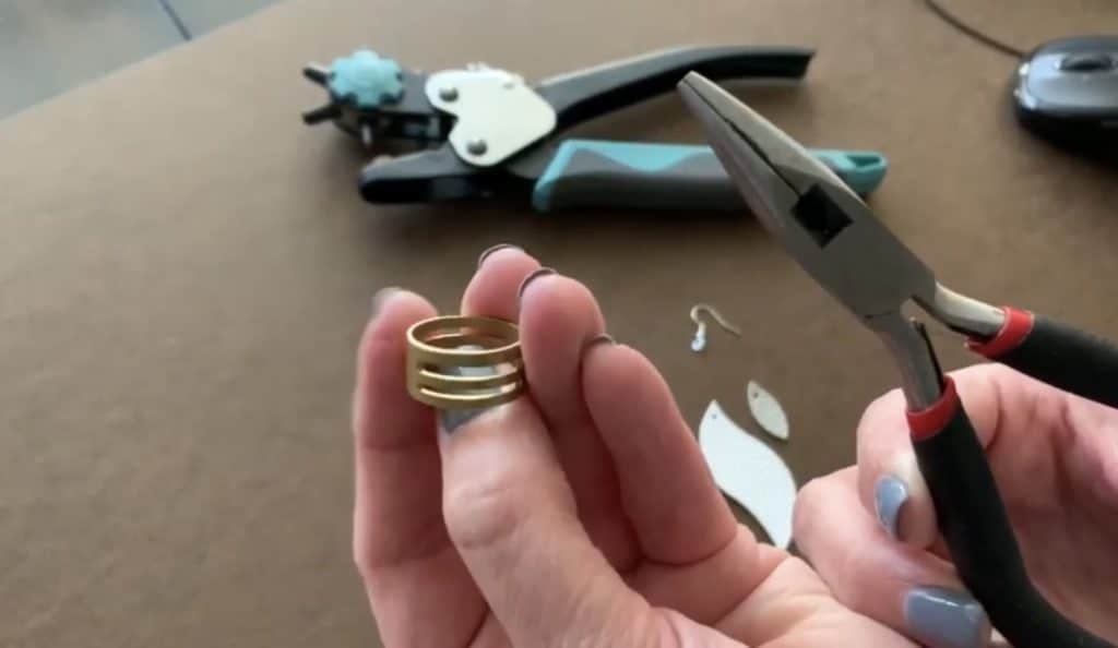 Putting faux leather earrings together