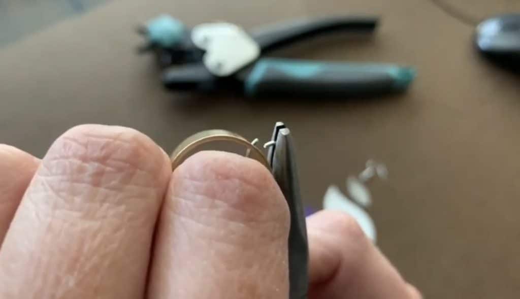 Putting faux leather earrings together