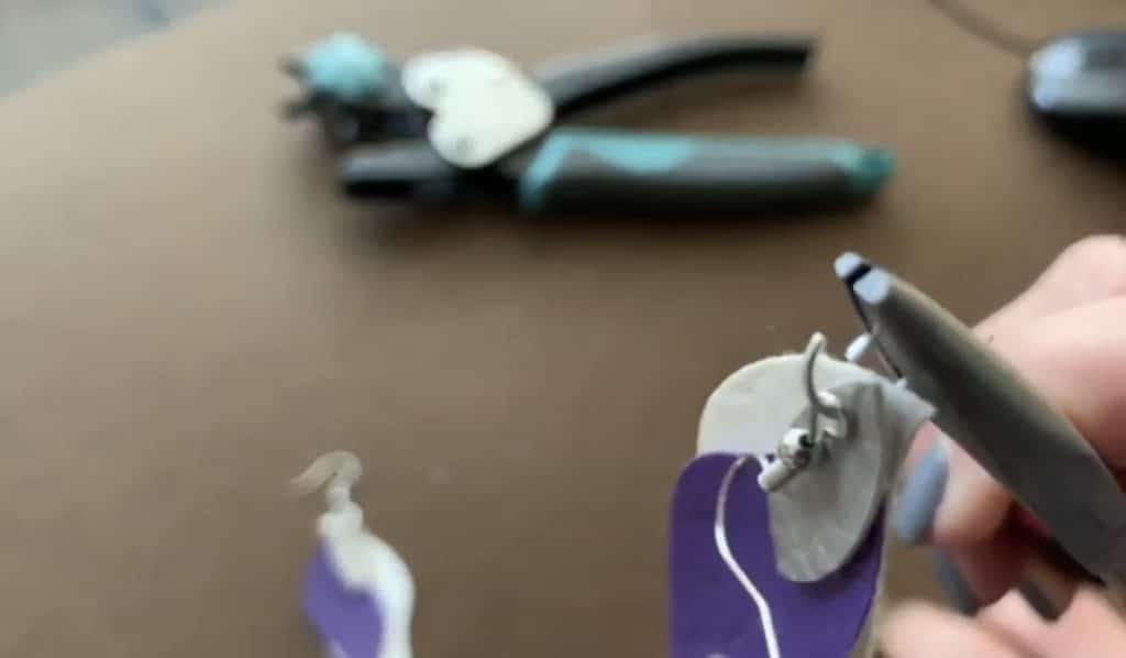 Putting faux leather earrings together