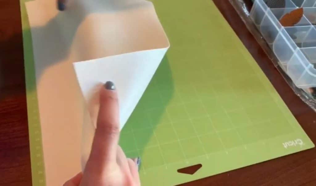 making diy faux leather earrings on cricut machine