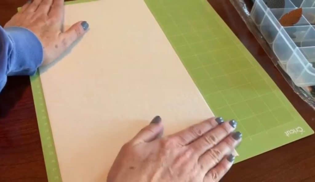 making diy faux leather earrings on cricut machine