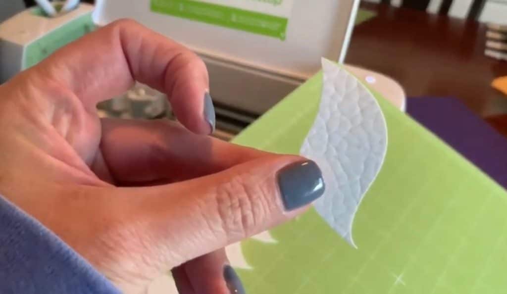 making diy faux leather earrings on cricut machine