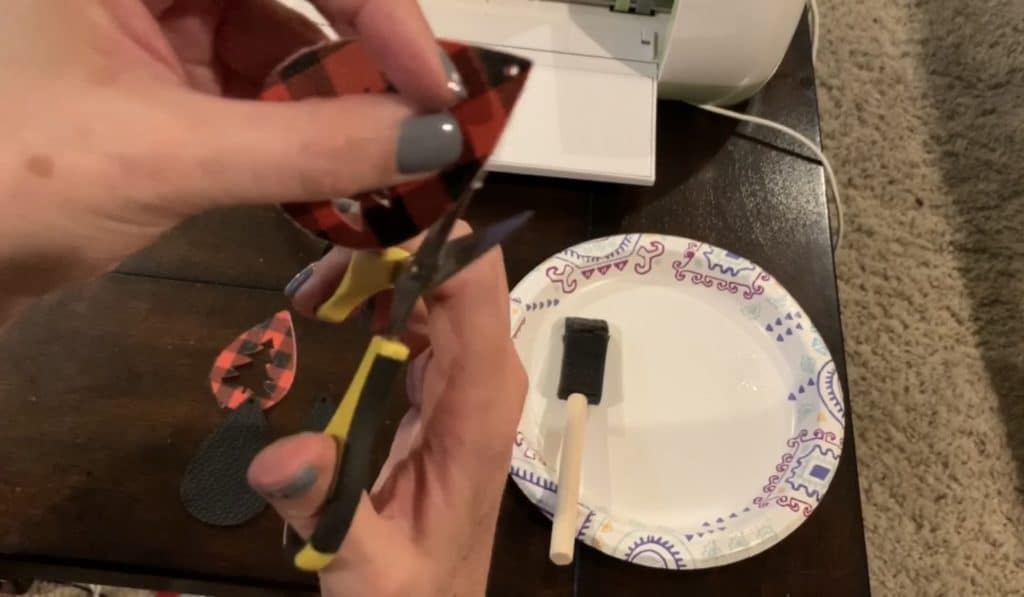 trimming faux leather earrings