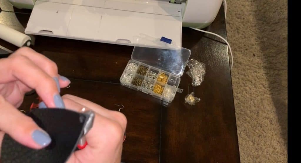 trimming faux leather earrings