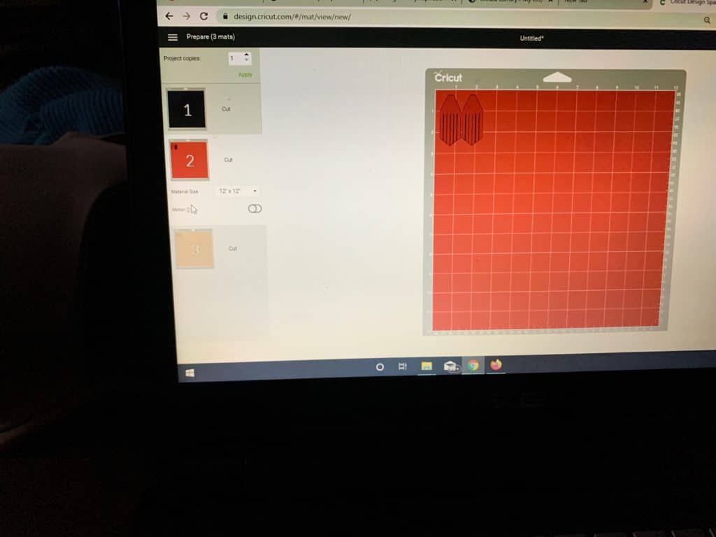 making diy faux leather earrings in Cricut design studio