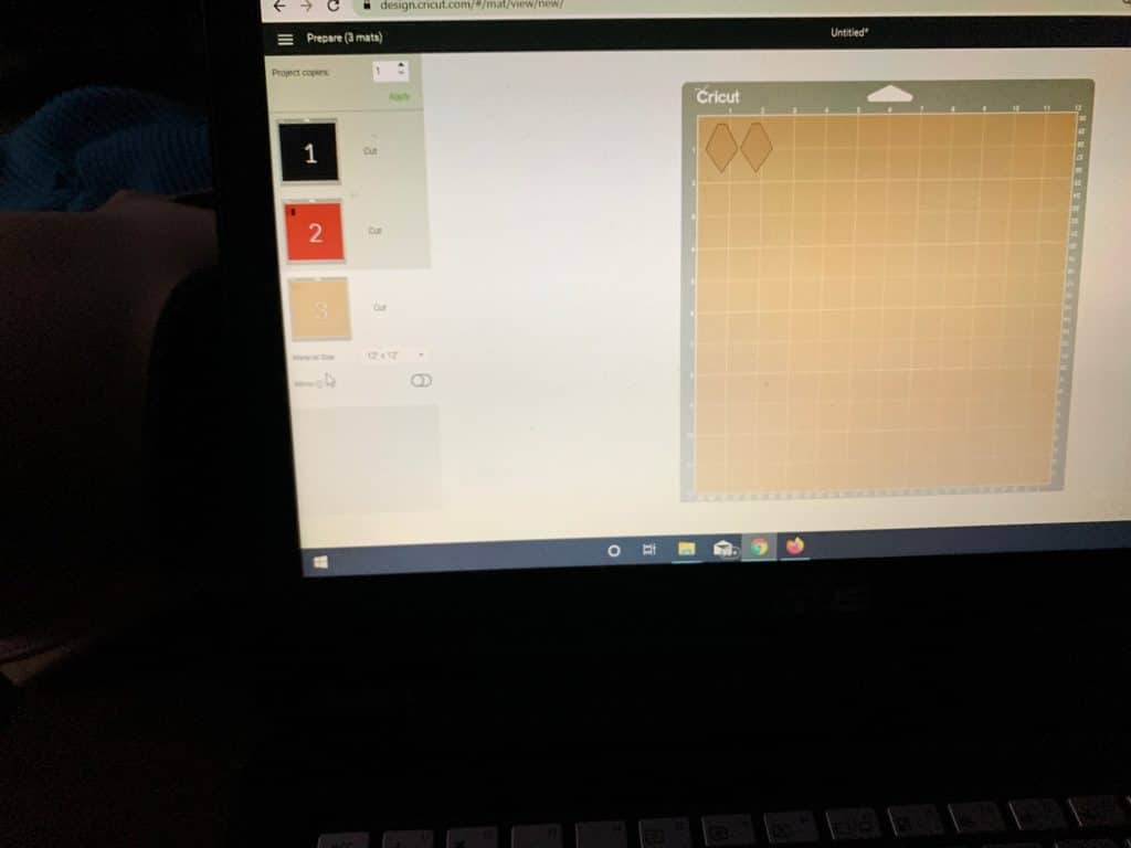 making diy faux leather earrings in Cricut design studio