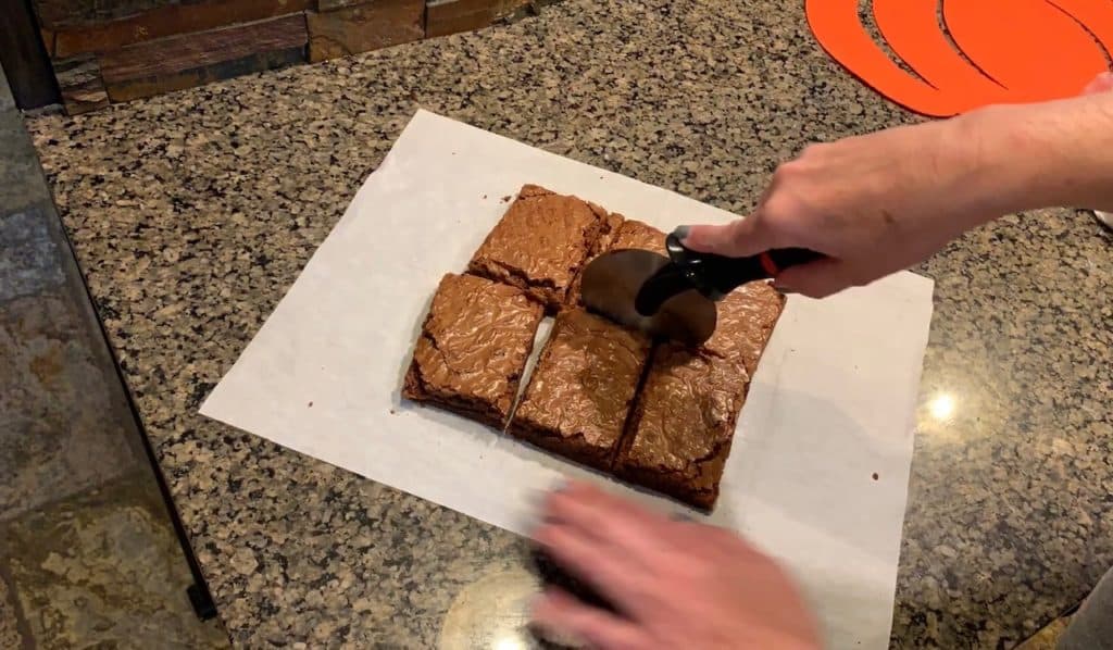 cutting the brownies