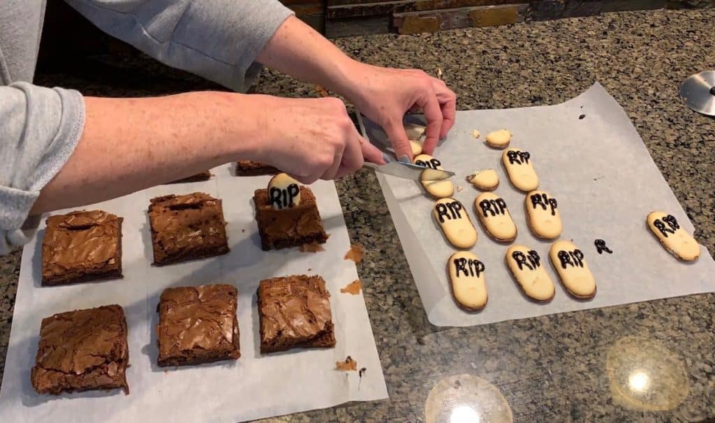 cutting Milano cookies