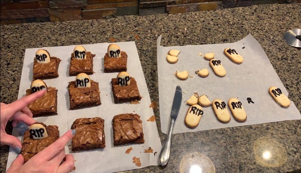 Pushing Milano cookies into brownies