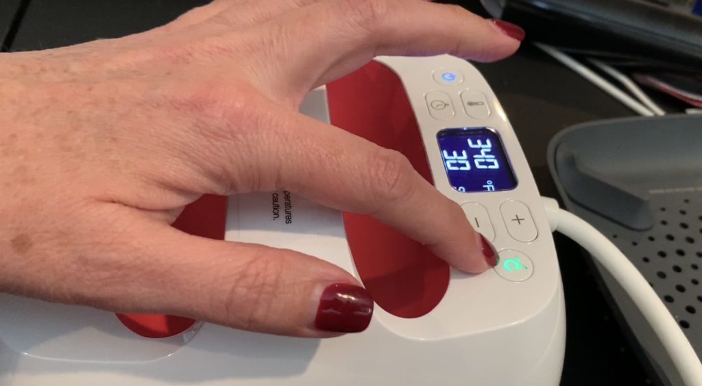 iron everyday heat transfer material onto the back of a cork sheet with a Cricut Easy Press