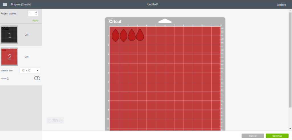 diy faux leather earrings on a cutting mat in Cricut Design Studio