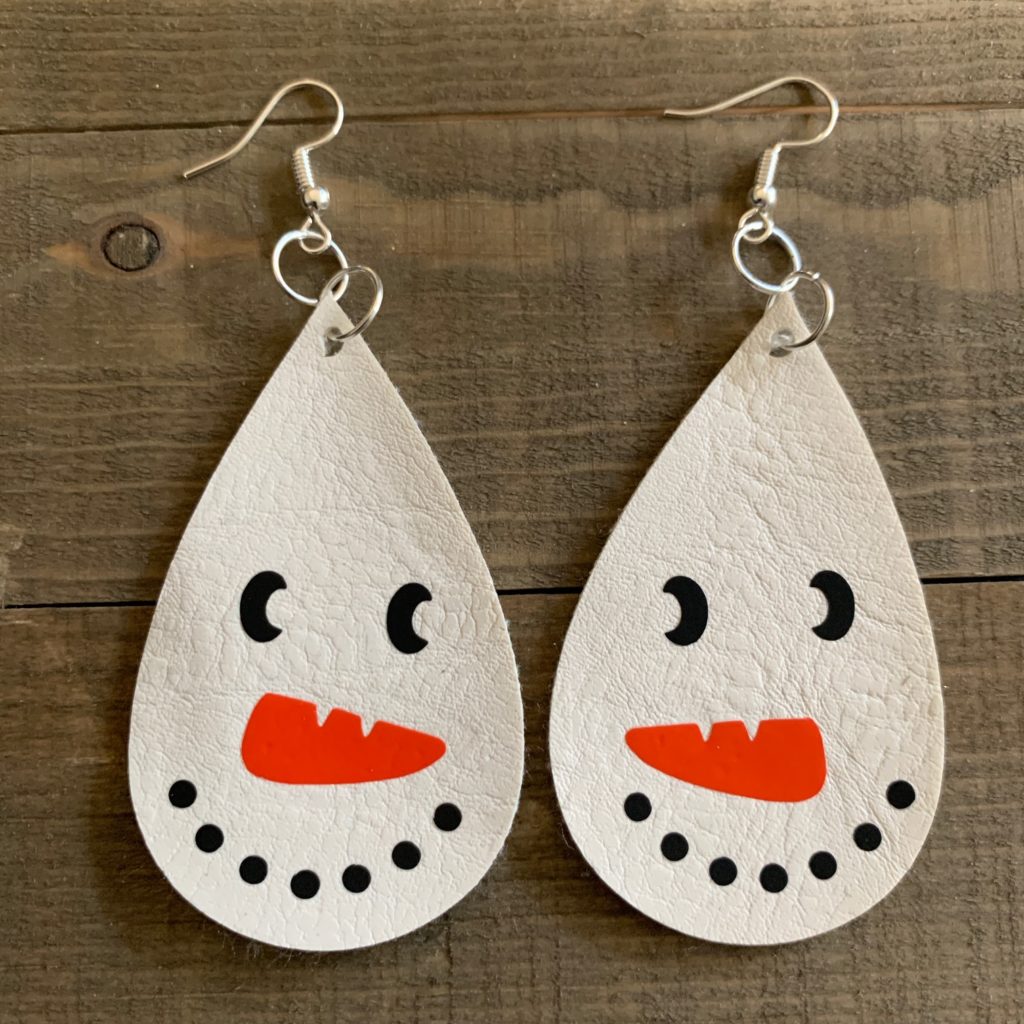 snowman faux leather earrings