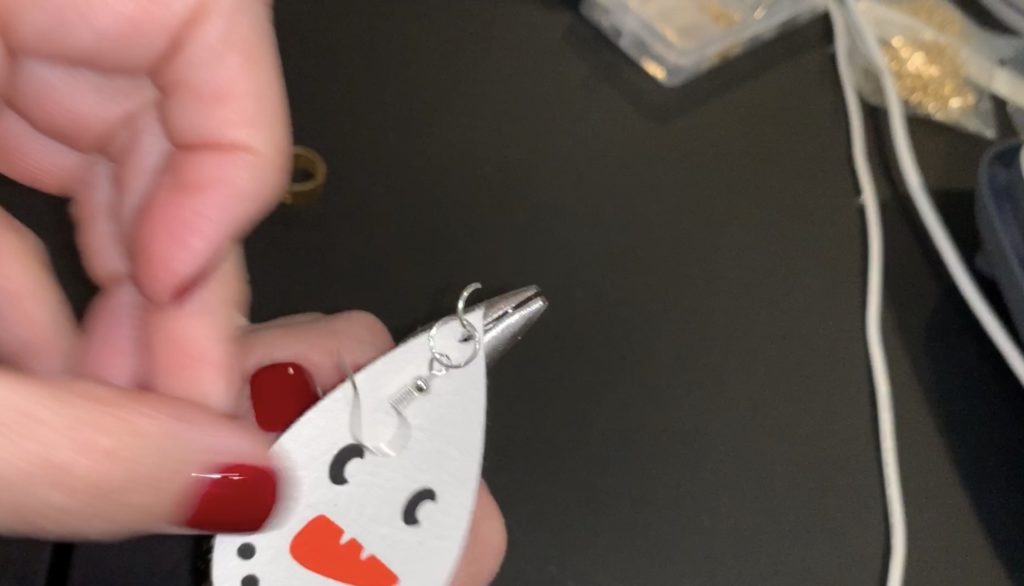putting together snowman faux leather earring