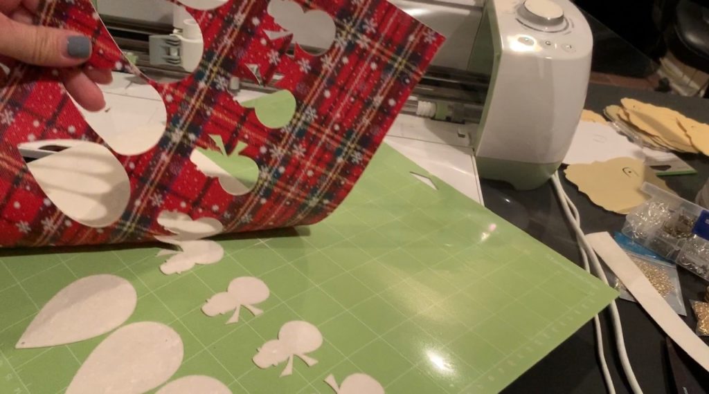 earring cuttouts on a Cricut mat
