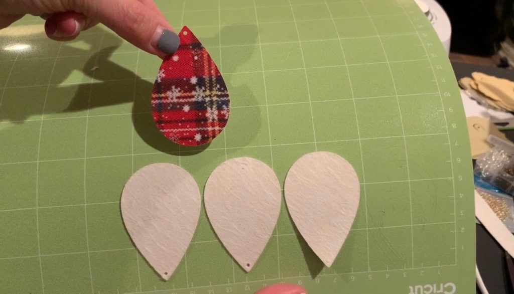 earring cuttouts on a Cricut mat