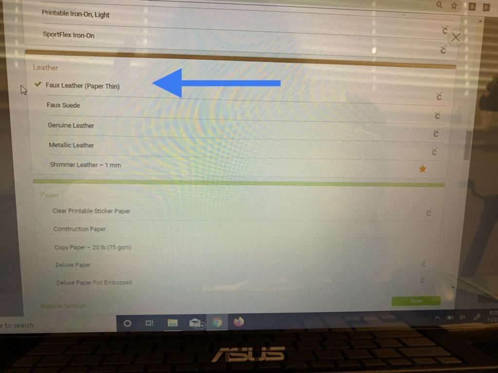 Making snowman faux leather earrings on the cricut machine