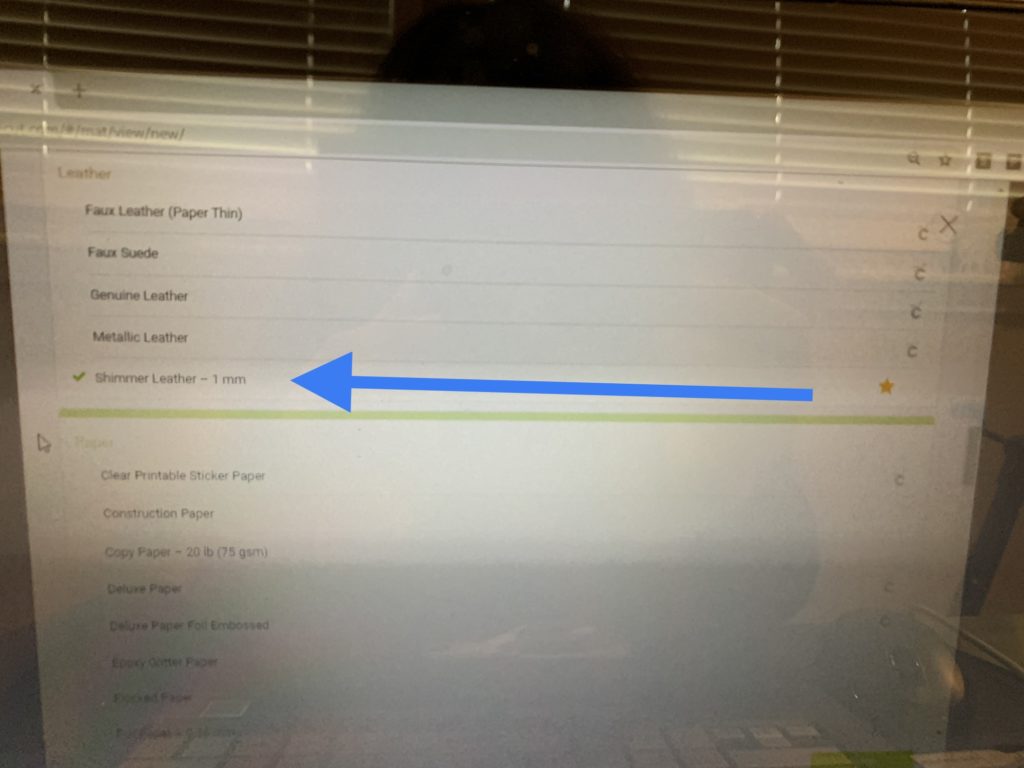 Making snowman faux leather earrings on the cricut machine