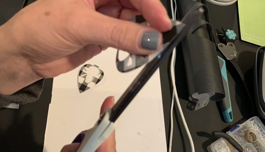 Making snowman faux leather earrings on the cricut machine