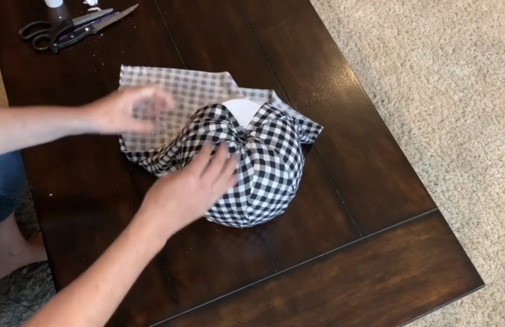 Wrapping fabric around fabric covered pumpkins