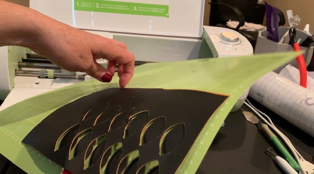 football faux leather earring pieces cut with Cricut Explore