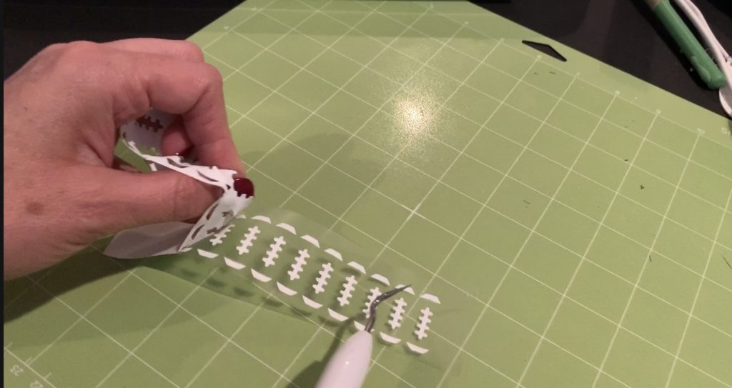 football markings on iron on vinyl for football faux leather earrings