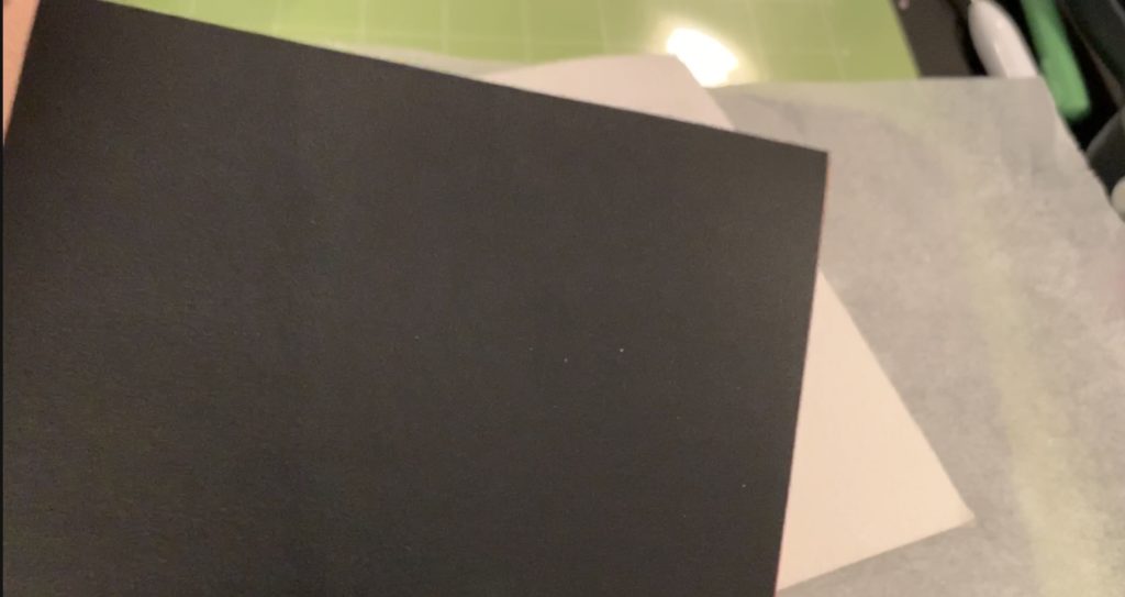 Cricut heat transfer vinyl ironed onto back of faux leather