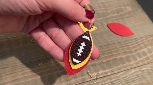 football faux leather earrings