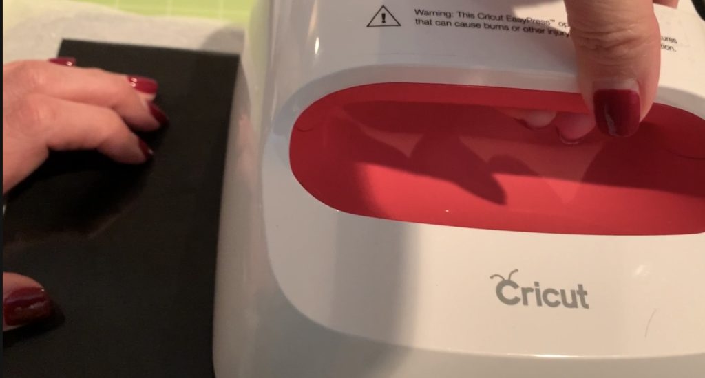Cricut Easy Press to iron on vinyl to back of faux leather