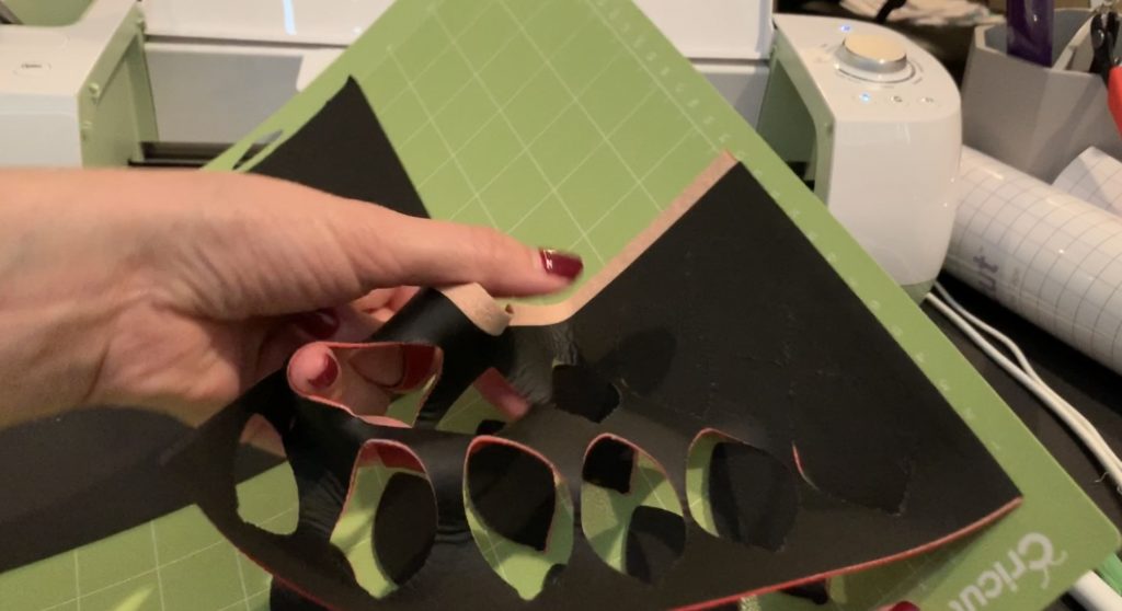 football faux leather earring pieces cut with Cricut Explore