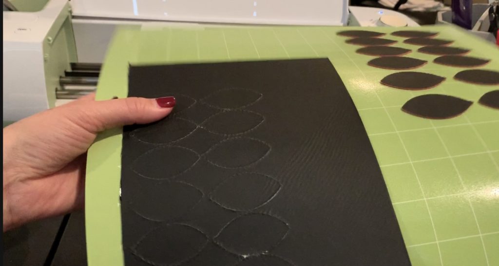 football faux leather earring pieces cut with Cricut Explore