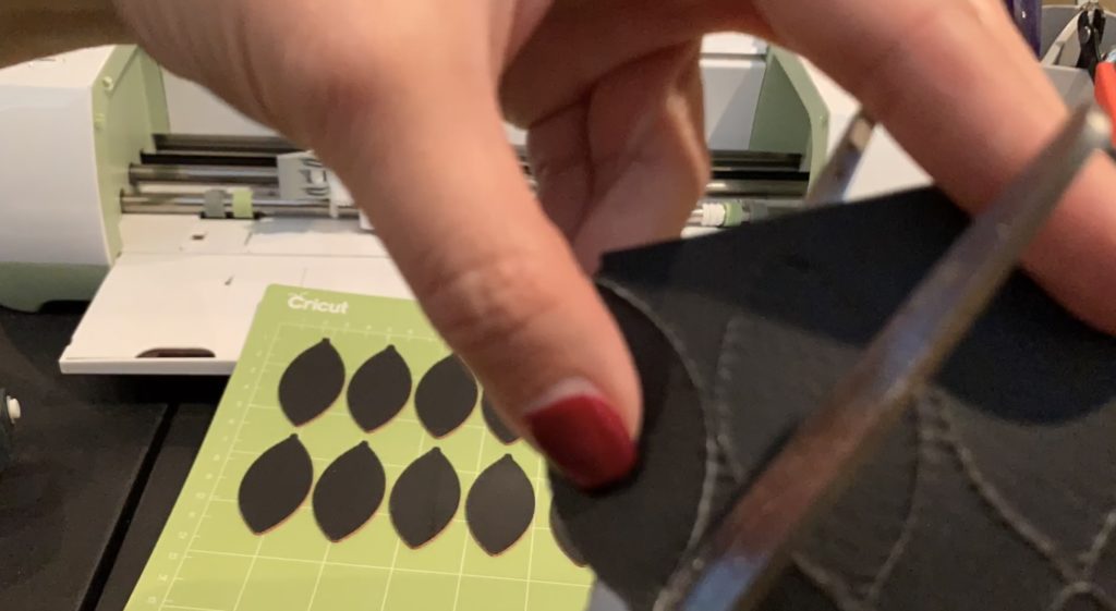 football faux leather earring pieces cut with Cricut Explore