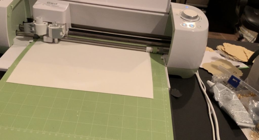 making snowflake faux leather earrings on the Cricut machine