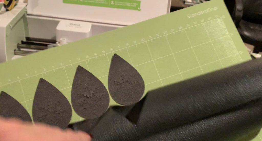 making snowflake faux leather earrings on the Cricut machine