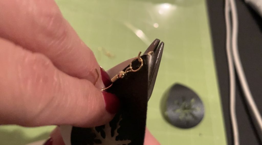 making snowflake faux leather earrings on the Cricut machine