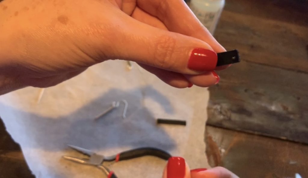 hole punch in a leather bar earring