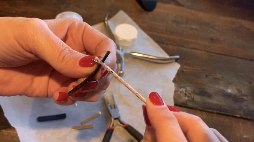 smoothing the edges of leather to control the flyaways
