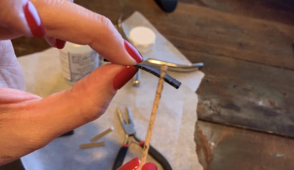 smoothing the edges of leather to control the flyaways