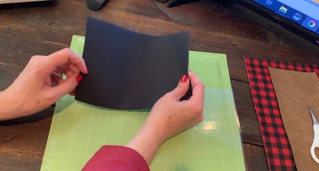 putting faux leather onto the Cricut mat
