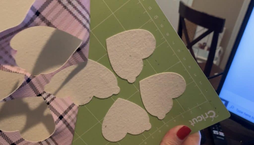 faux leather hearts cut on the Cricut machine