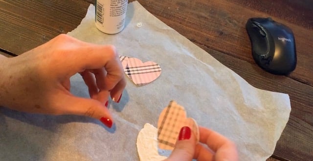 Gluing faux leather heart earrings together, front and back