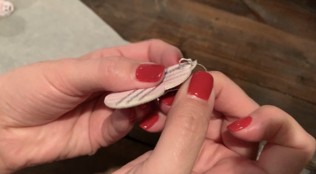 Putting hooks onto the Valentine's Day earrings DIY project