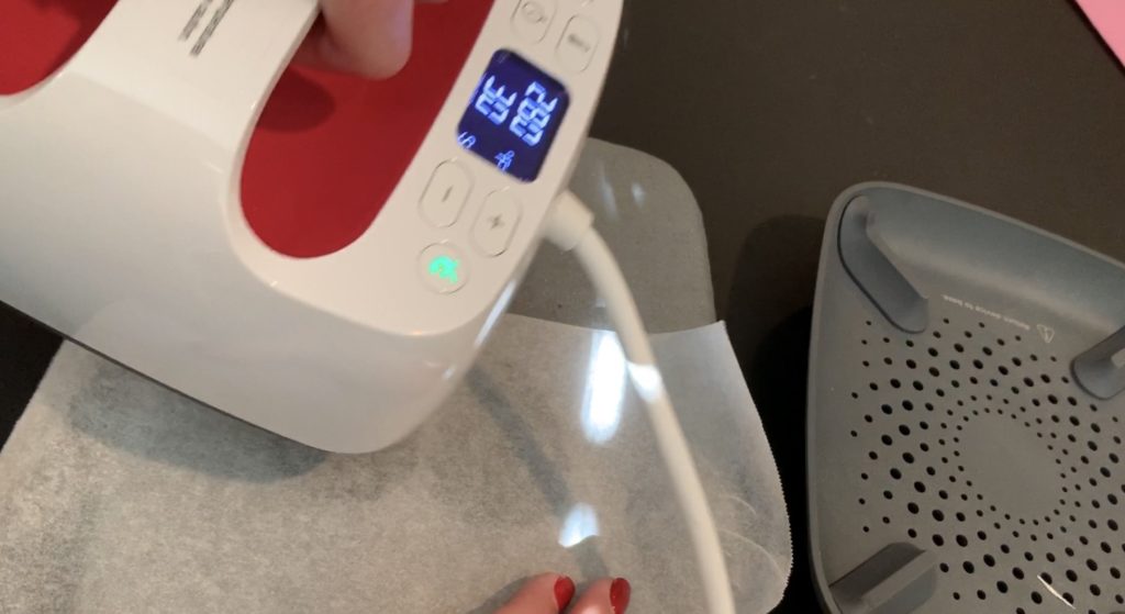 heat transfer vinyl (HTV) with weeding complete and ready to iron onto the the leather earrings